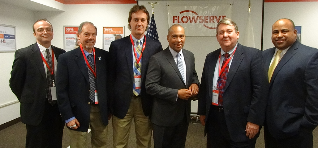 Several men standing together for photo.